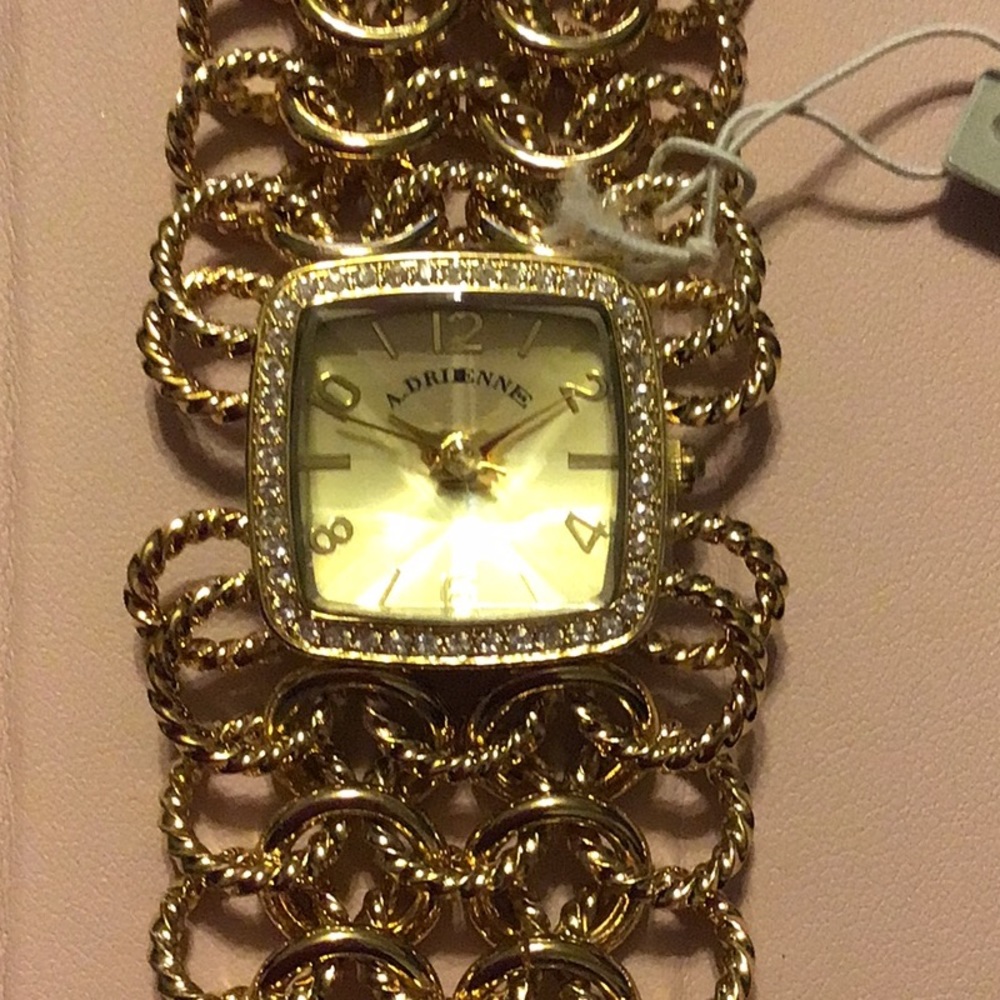 NWT, L E COUTURE WATCHES BY ADRIENNE,GOLDEN LINK BRACELET,WITH EXTENSIONS.